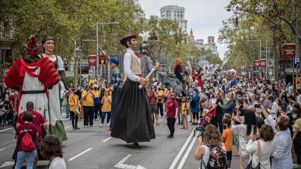 Giants and big-headed figures during La Mercè in Barcelona