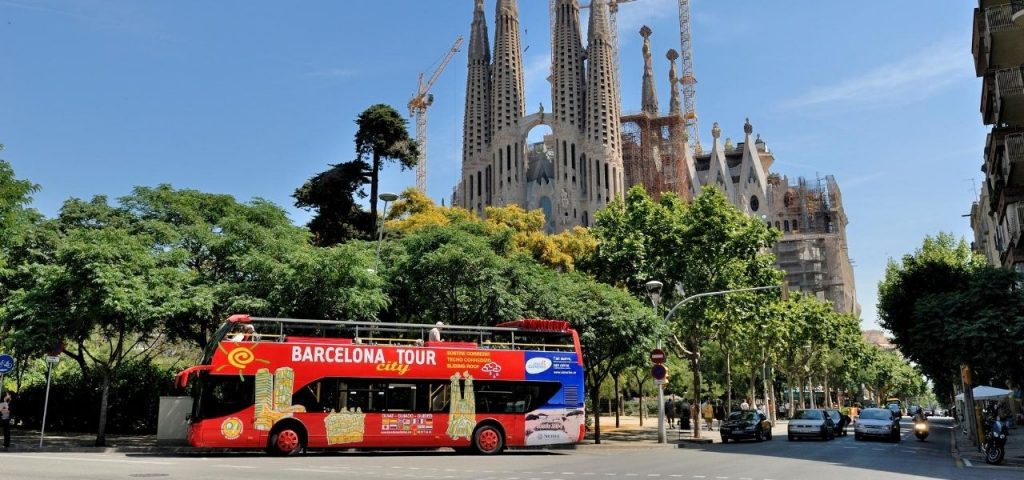 Barcelona Hop on Hop off bus in front of Sagrada Familia