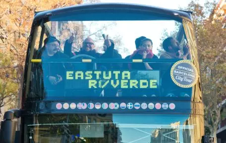 Tourists riding the Barcelona tourist bus