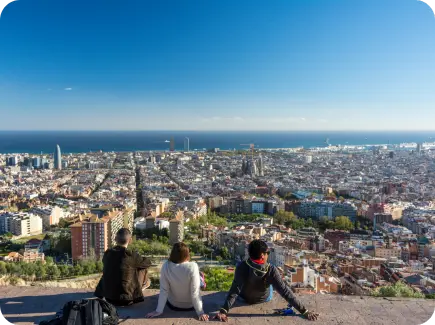 Three friends enjoying the panoramic views of Barcelona